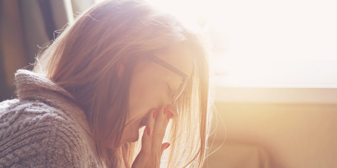 pretty woman waking up and yawning